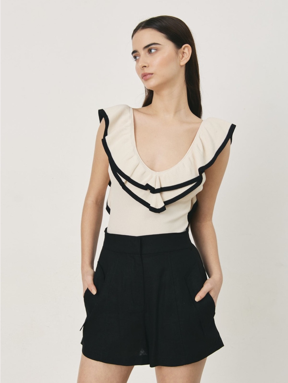 Deluc knit low back ruffle bodysuit